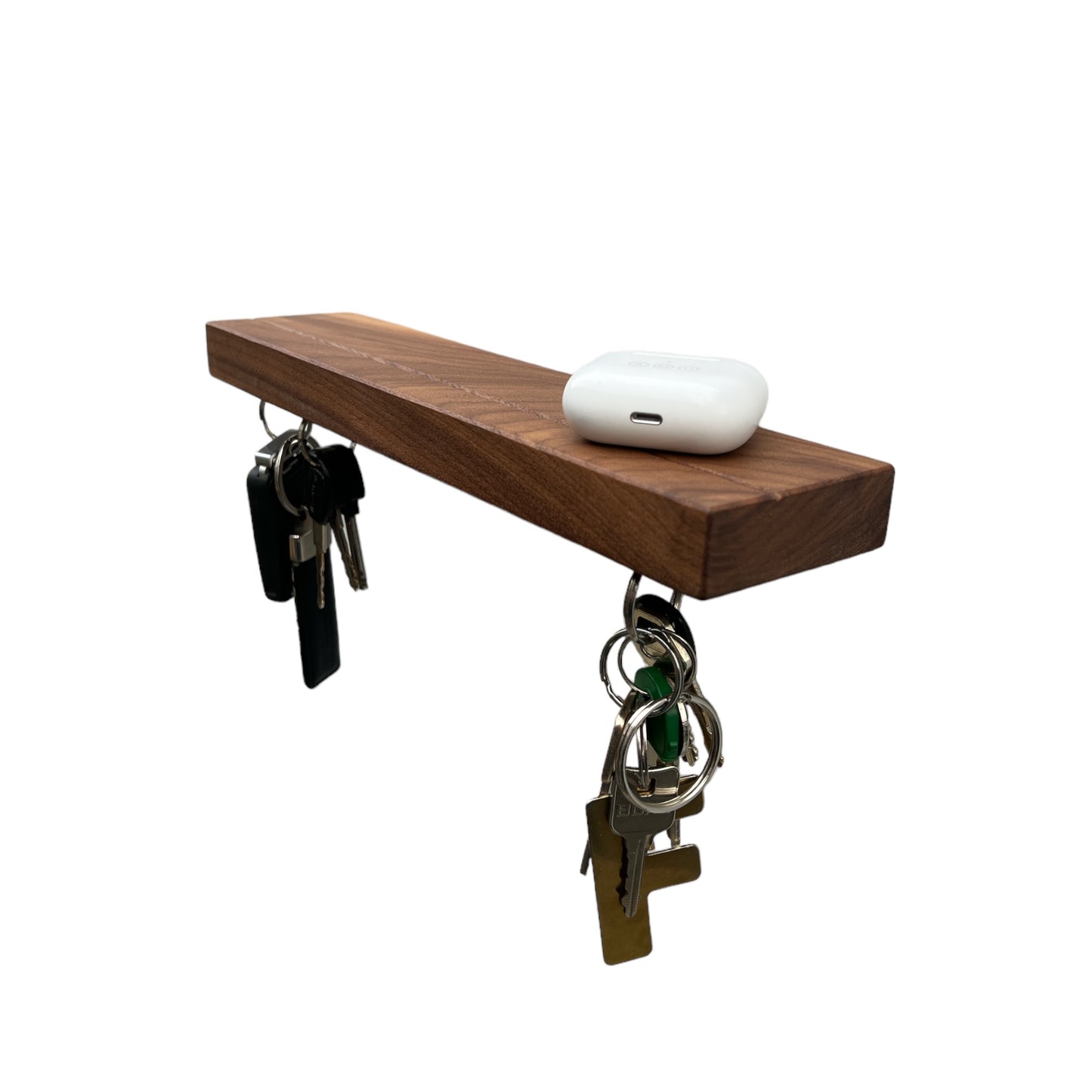 Sleutelplank, sleutelrek, sleutelrekje, sleutelhouder van massief notenhout. Voorzien van 7 supersterke magneten. HangKey Plankie XL noten schuin bovenaanzicht